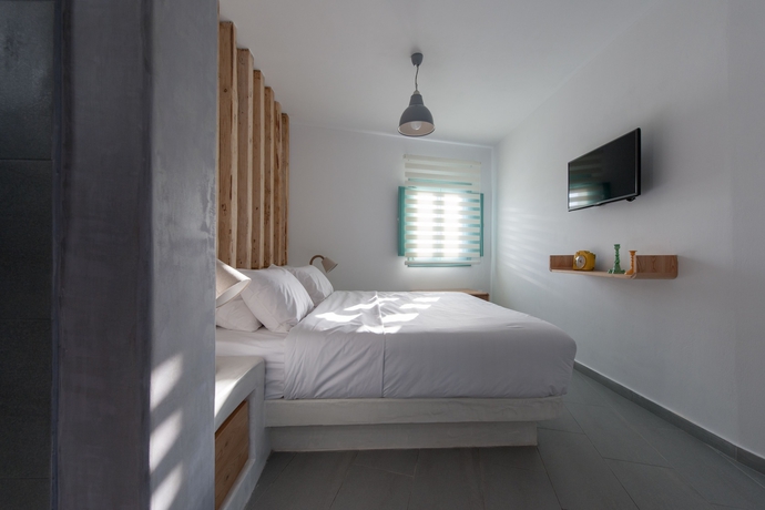 Imagen de la habitación del Hotel Neptune Luxury Spa Suites. Foto 4