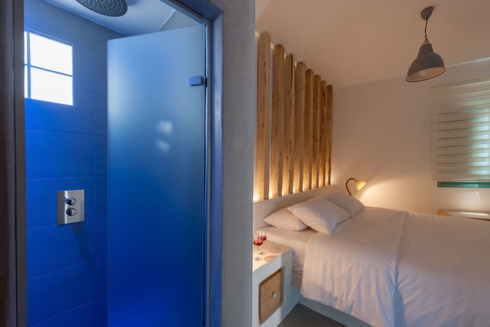 Imagen de la habitación del Hotel Neptune Luxury Spa Suites. Foto 6