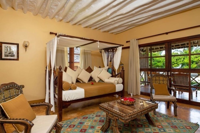 Imagen de la habitación del Hotel Neptune Pwani Beach Resort and Spa Zanzibar - All Inclusive. Foto 2
