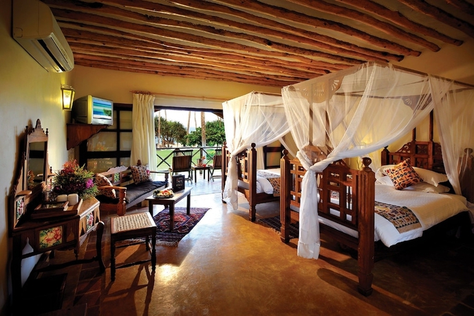 Imagen de la habitación del Hotel Neptune Pwani Beach Resort and Spa Zanzibar - All Inclusive. Foto 3