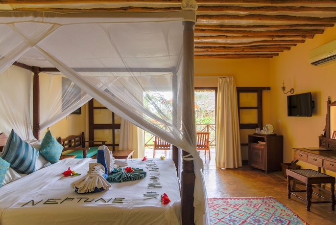 Imagen de la habitación del Hotel Neptune Pwani Beach Resort and Spa Zanzibar - All Inclusive. Foto 17