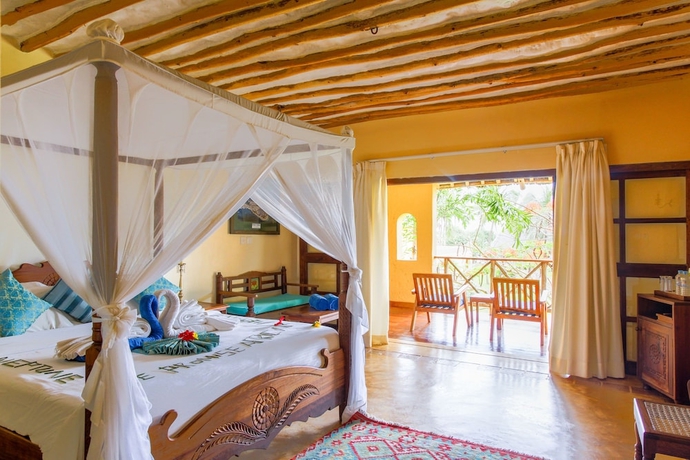 Imagen de la habitación del Hotel Neptune Pwani Beach Resort and Spa Zanzibar - All Inclusive. Foto 18