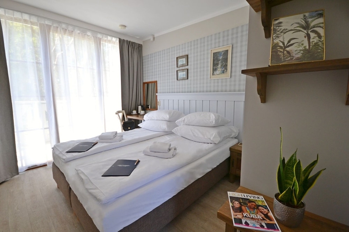 Imagen de la habitación del Hotel Neptuno Resort and Spa. Foto 4