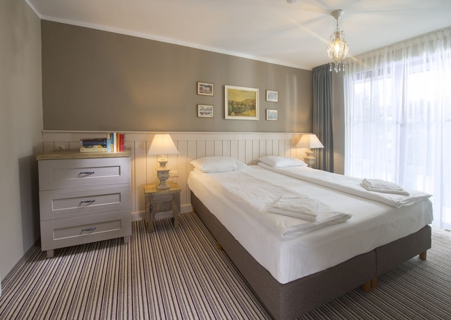 Imagen de la habitación del Hotel Neptuno Resort and Spa. Foto 16