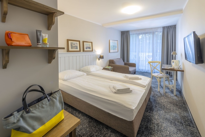 Imagen de la habitación del Hotel Neptuno Resort and Spa. Foto 17