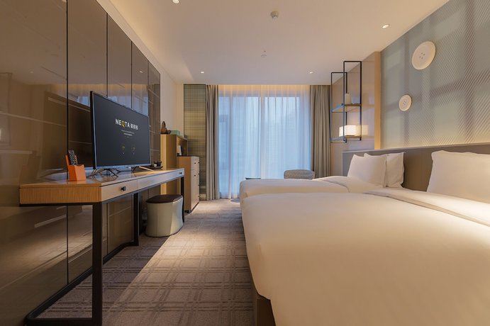 Imagen de la habitación del Hotel Neqta Hangzhou Westlake. Foto 13