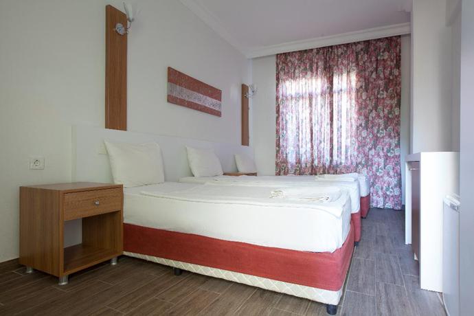 Imagen de la habitación del Hotel Nergos Side. Foto 8