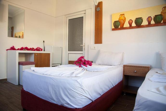 Imagen de la habitación del Hotel Nergos Side. Foto 9