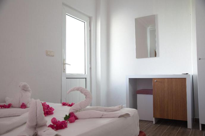 Imagen de la habitación del Hotel Nergos Side. Foto 14
