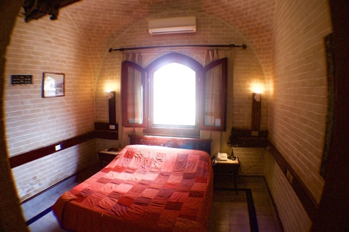 Imagen de la habitación del Hotel Nesima Resort. Foto 10