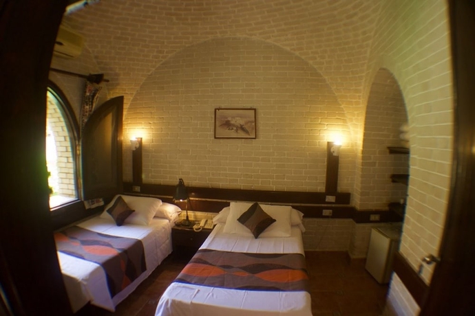 Imagen de la habitación del Hotel Nesima Resort. Foto 12