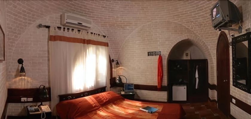 Imagen de la habitación del Hotel Nesima Resort. Foto 14