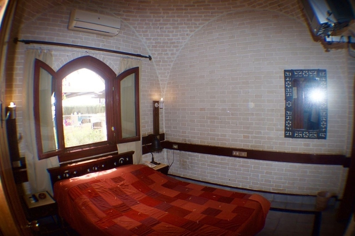 Imagen de la habitación del Hotel Nesima Resort. Foto 15