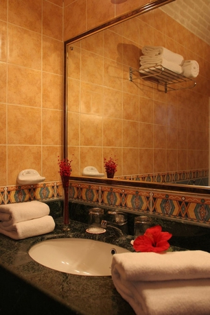 Imagen de la habitación del Hotel Nesima Resort. Foto 16