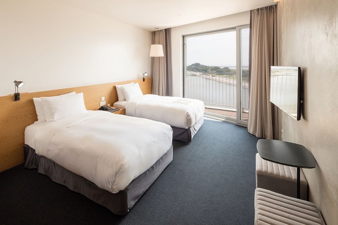 Imagen de la habitación del Hotel Nest Hotel. Foto 14