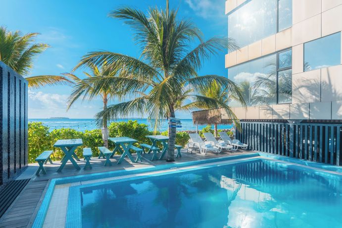 Imagen de la piscina del Hotel Nest by Hawkss Kamadhoo Baa Atoll. Foto 15