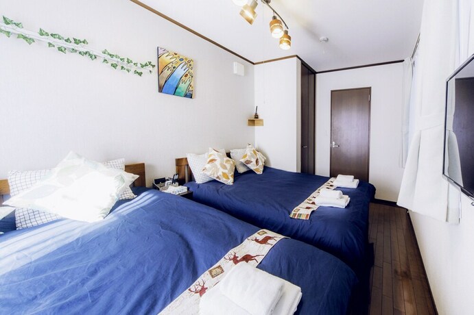 Imagen de la habitación del Hotel Nestay Suite Tokyo Shibuya. Foto 35