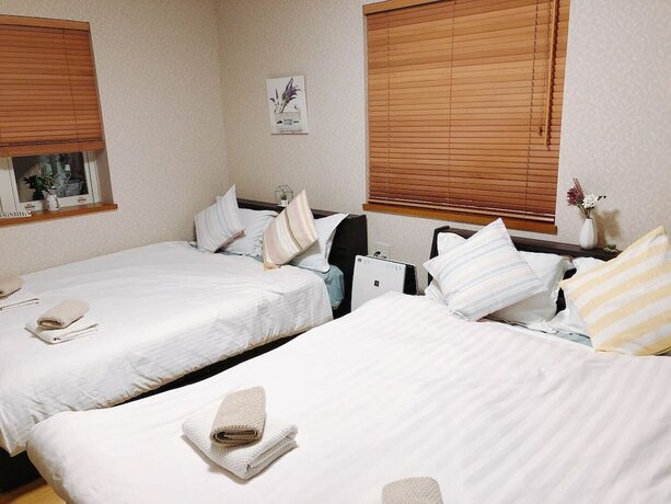 Imagen de la habitación del Hotel Nestle Suite Tokyo Shinokubo. Foto 19