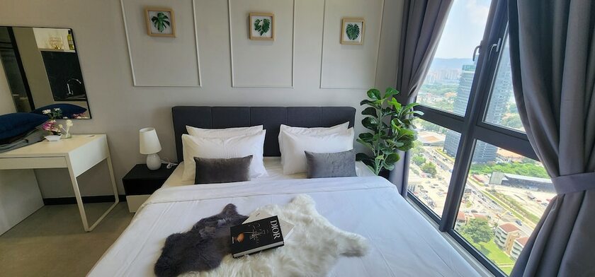 Imagen de la habitación del Hotel Neu Suites 3rdnvenue By Perfect Host. Foto 12