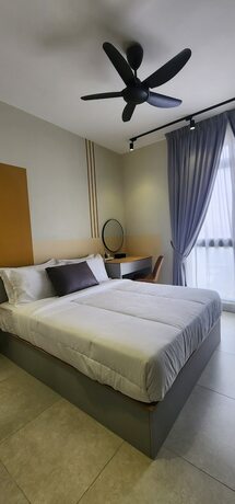 Imagen de la habitación del Hotel Neu Suites 3rdnvenue By Perfect Host. Foto 13
