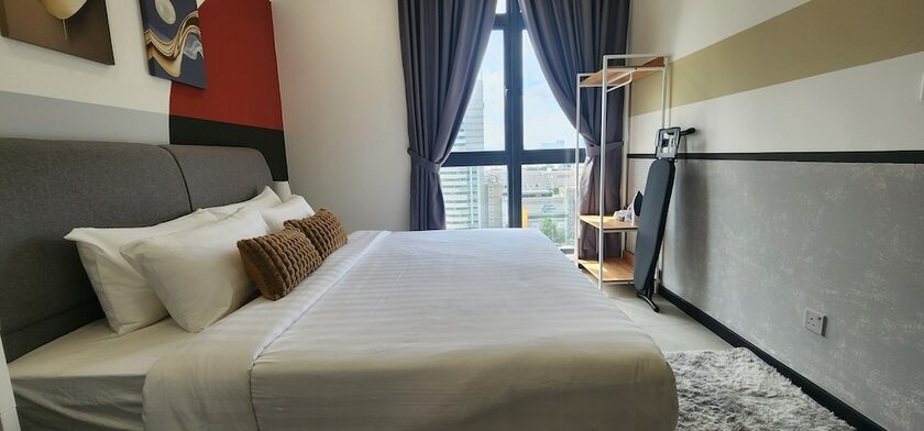 Imagen de la habitación del Hotel Neu Suites 3rdnvenue By Perfect Host. Foto 14