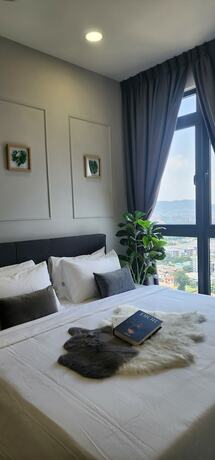 Imagen de la habitación del Hotel Neu Suites 3rdnvenue By Perfect Host. Foto 17