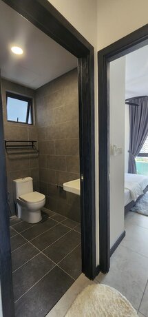 Imagen de la habitación del Hotel Neu Suites 3rdnvenue By Perfect Host. Foto 19