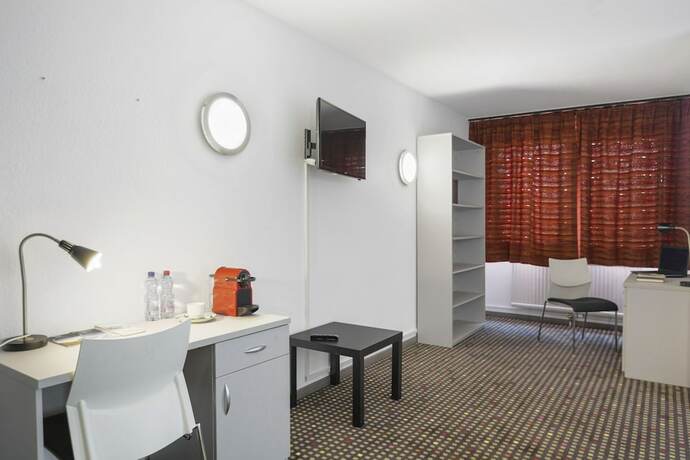 Imagen de la habitación del Hotel Neuchatel City. Foto 20