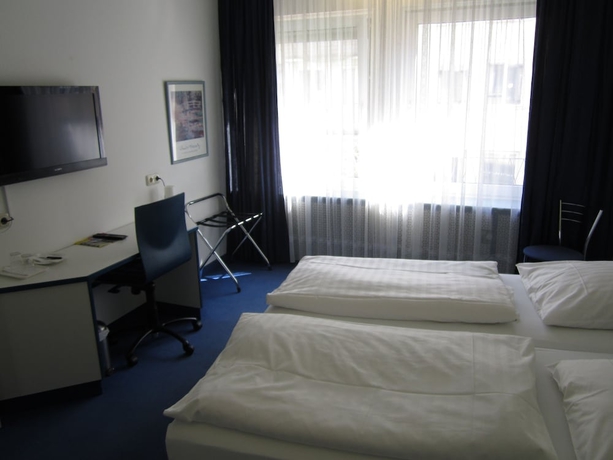 Imagen de la habitación del Hotel Neue Kraeme. Foto 8