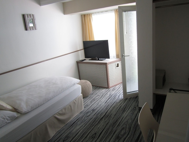 Imagen de la habitación del Hotel Neue Kraeme. Foto 11