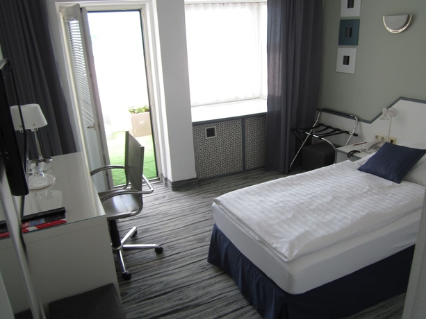 Imagen de la habitación del Hotel Neue Kraeme. Foto 13