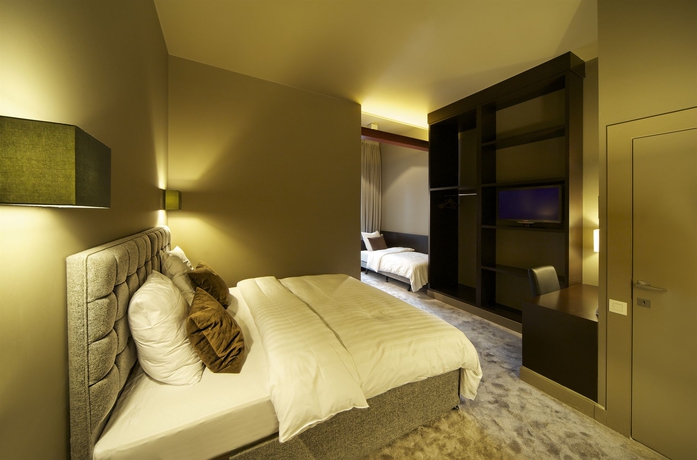 Imagen de la habitación del Hotel Neufchatel Belgian. Foto 11