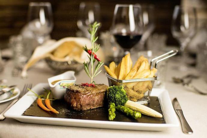 Imagen del bar/restaurante del Hotel Neuhaus, Saalbach-Hinterglemm . Foto 8