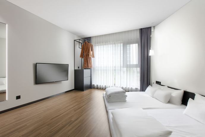 Imagen de la habitación del Hotel Neulpum Hotel. Foto 16