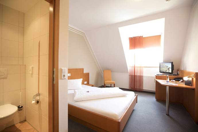 Imagen de la habitación del Hotel Neumaiers Hirsch Gasthof and Landhotel. Foto 11