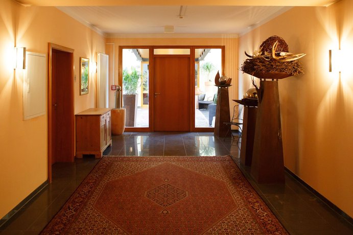 Imagen de los interiores del Hotel Neumaiers Hirsch Gasthof and Landhotel. Foto 17