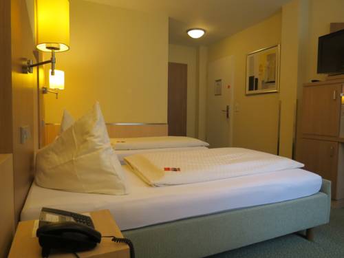 Imagen de la habitación del Hotel Neuthor. Foto 11