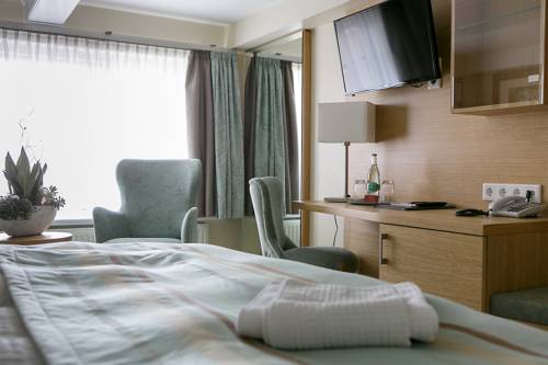 Imagen de la habitación del Hotel Neuwarft Dependance. Foto 1