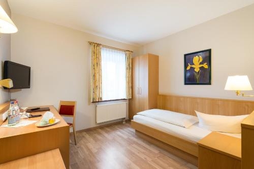 Imagen de la habitación del Hotel Neuwirt, Goldach. Foto 9