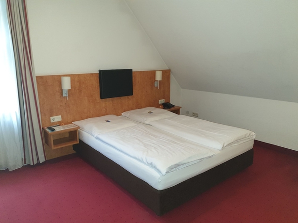Imagen de la habitación del Hotel Neuwirtshaus. Foto 7