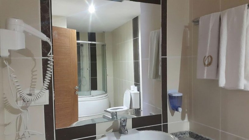 Imagen de la habitación del Hotel Nevan Suite. Foto 10