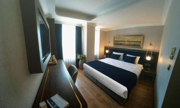 Imagen de la habitación del Hotel Nevi and Suites İstanbul Taksim. Foto 19