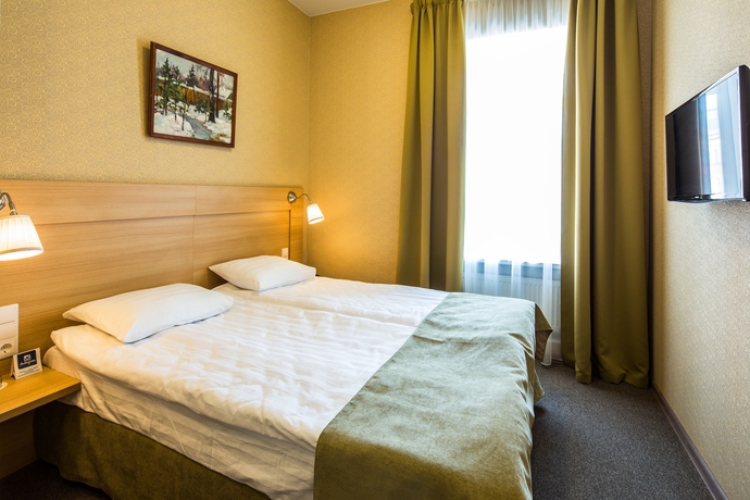 Imagen de la habitación del Hotel Nevsky Grand Apartments. Foto 11