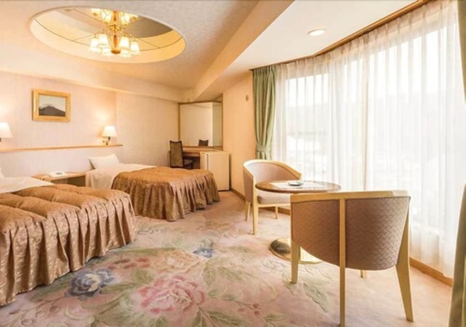 Imagen de la habitación del Hotel New Akan. Foto 11