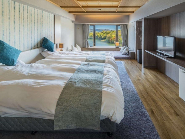 Imagen de la habitación del Hotel New Akan. Foto 14