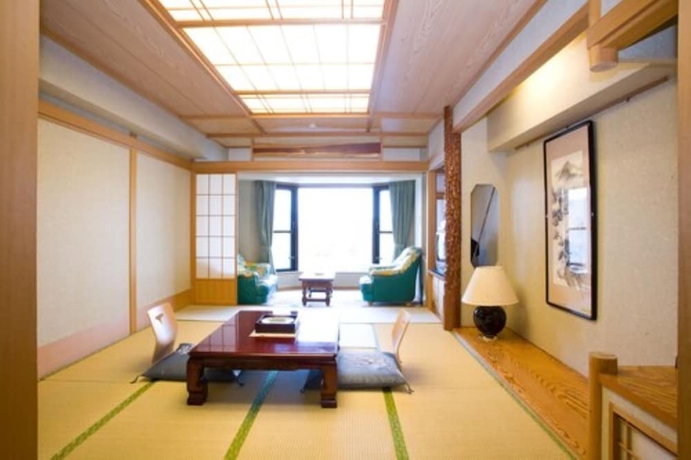 Imagen de la habitación del Hotel New Akan. Foto 17