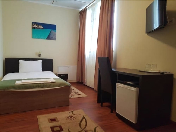 Imagen de la habitación del Hotel New, Baia Mare. Foto 5