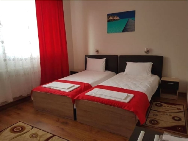 Imagen de la habitación del Hotel New, Baia Mare. Foto 11