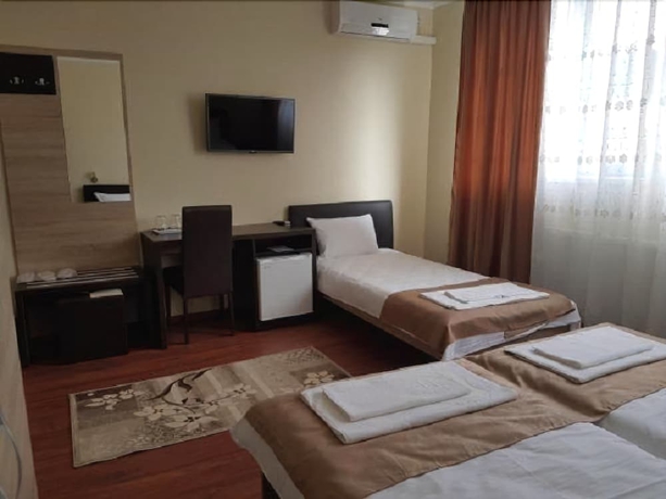 Imagen de la habitación del Hotel New, Baia Mare. Foto 13