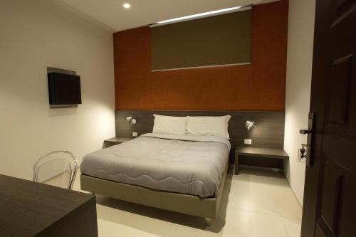 Imagen de la habitación del Hotel New Bari. Foto 6